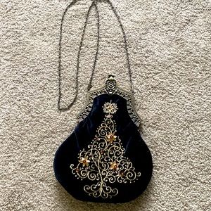 Black velvet Victorian evening bag . Purse snap closure small inside pocket.